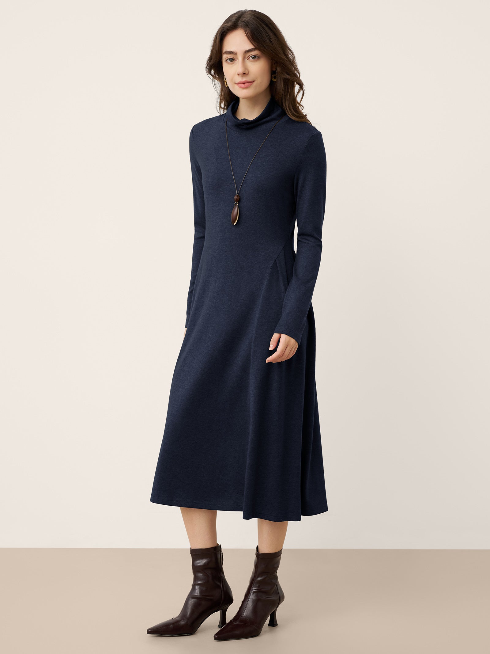 Wool Sculpted Pleats Turtleneck Maxi Dress BRIAR Wool Sculpted Pleats Turtleneck Maxi Dress BRIAR